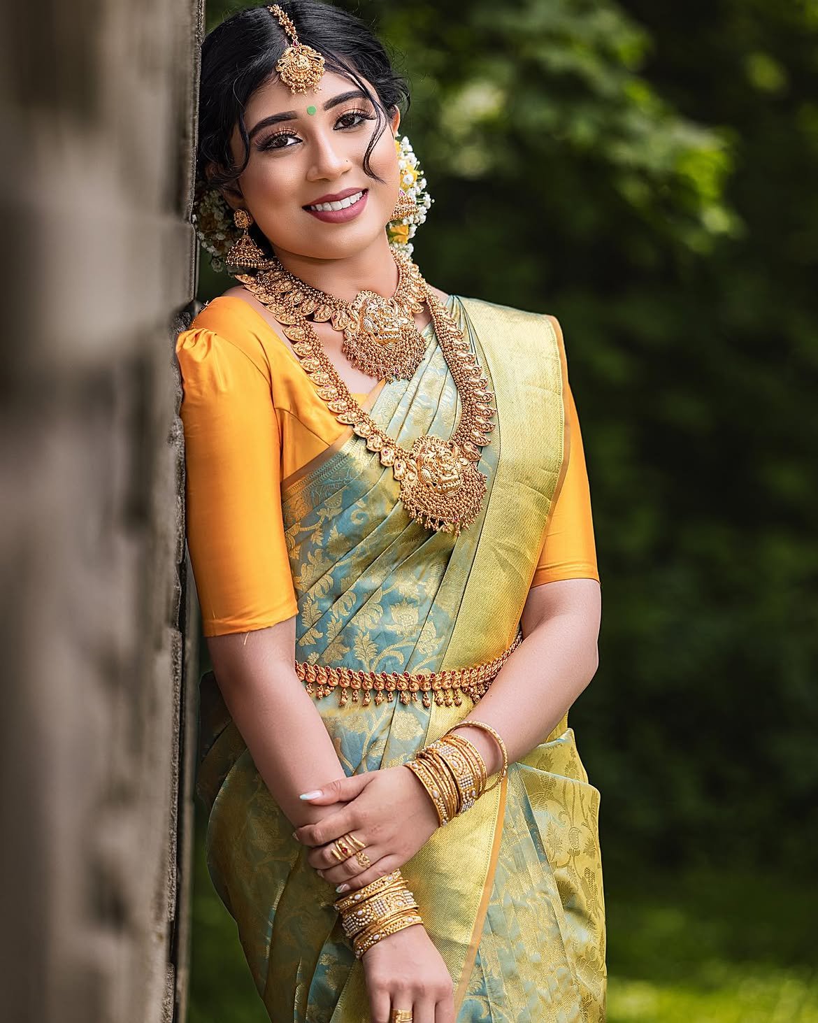 Bride in a finished saree drape